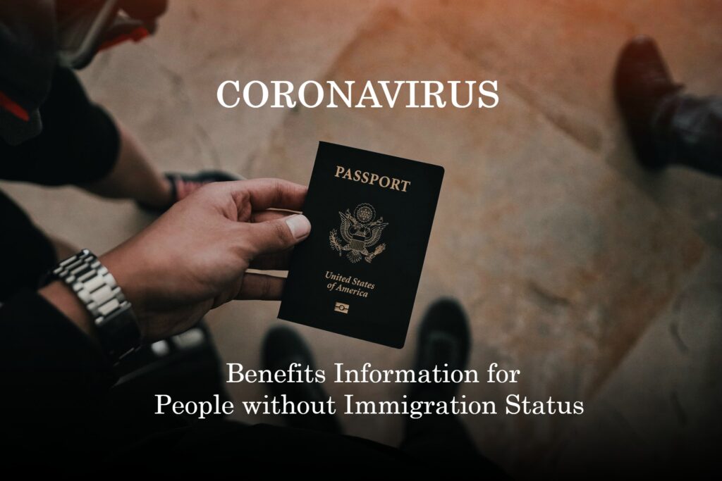 A person holding their passport in front of the word coronavirus.